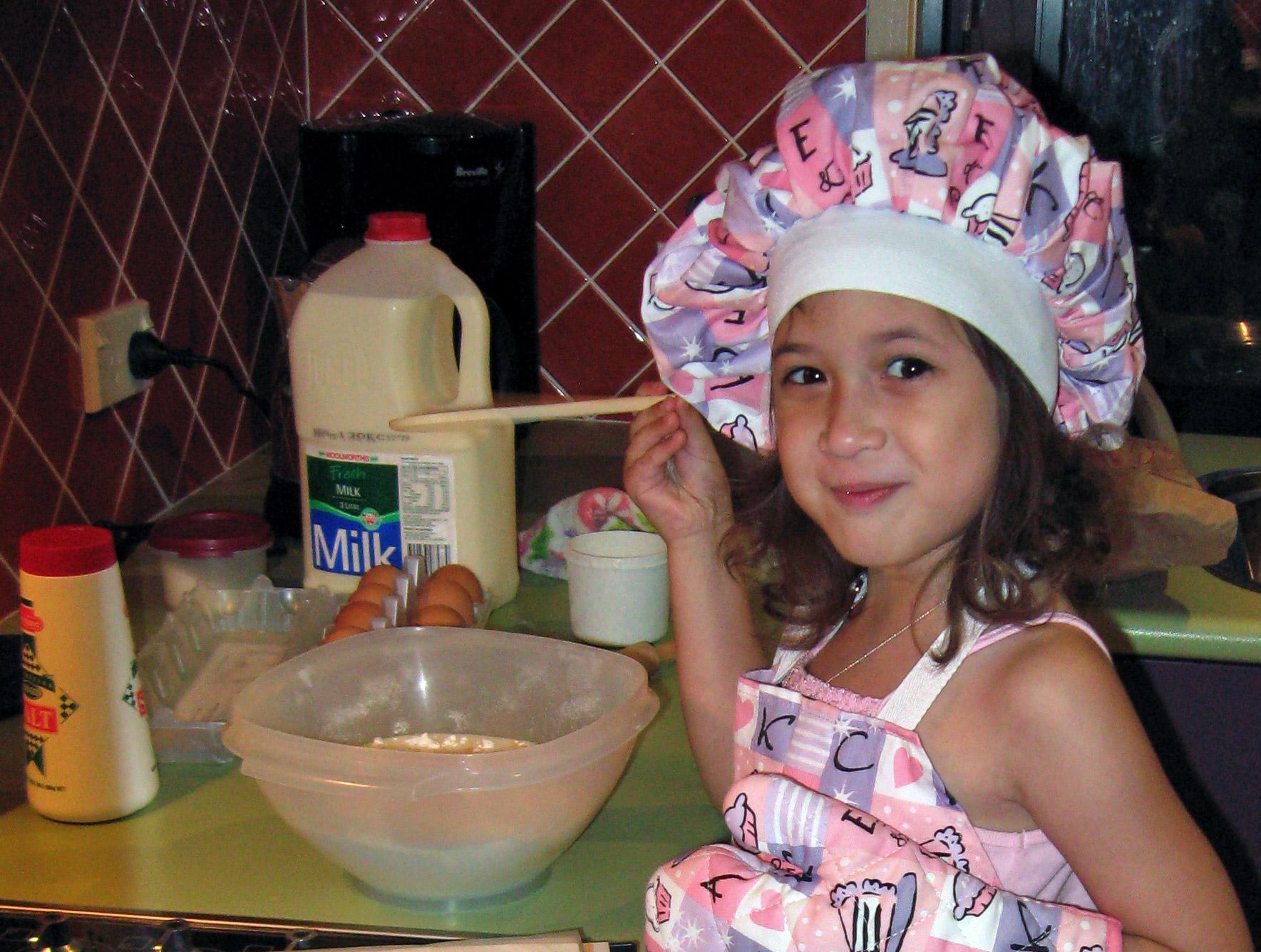 Young child cooking